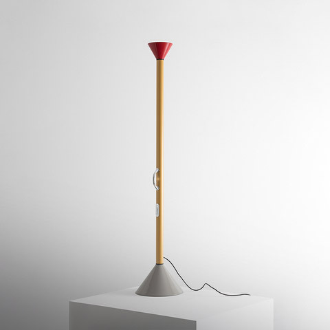 Artemide Callimaco floor lamp: tall yellow stem, red cone top diffuser, grey base, two white switches, black power cord