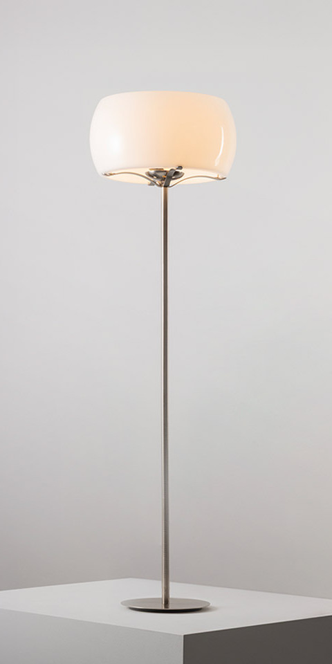 Artemide Clitunno floor lamp with opal white glass dome shade on a slender brushed metal stem and round base