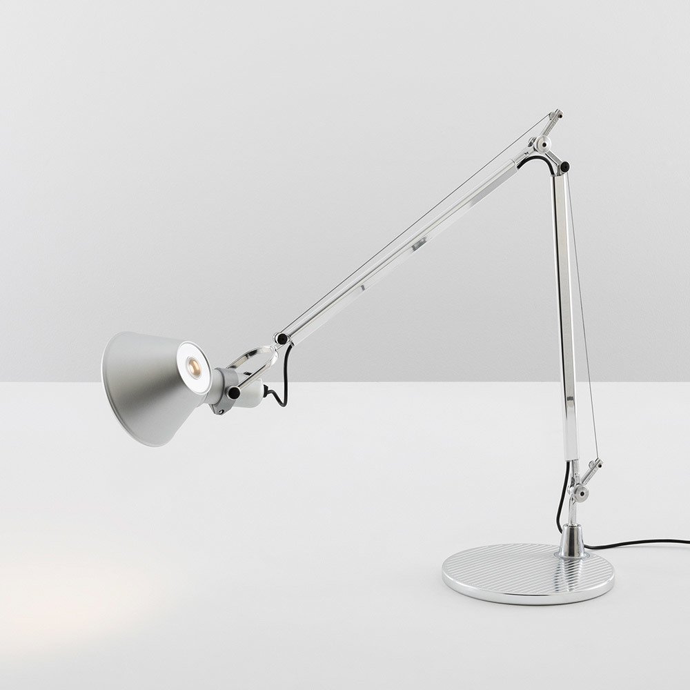 Tolomeo aluminium table lamp with adjustable articulated arm and conical shade.