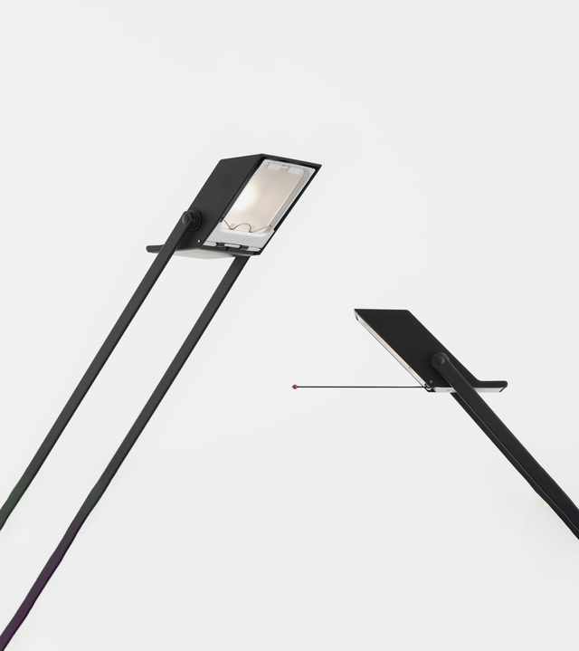 Two black floor lamps with slim angled stems: left with rectangular frosted diffuser head, right shown as flat panel detail
