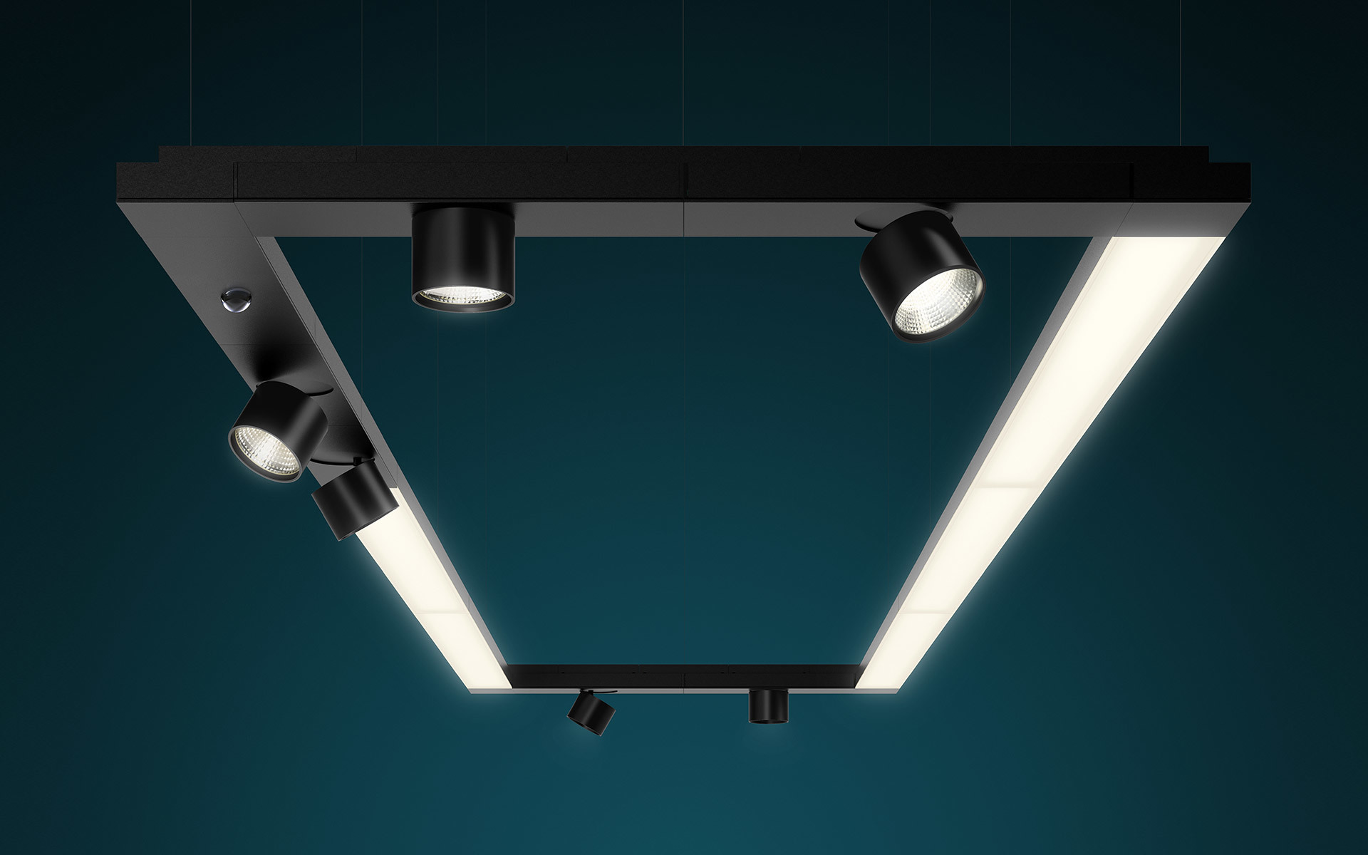 Sistema di illuminazione a sospensione rettangolare nero con pannelli LED integrati e quattro faretti cilindrici orientabili, su sfondo verde acqua