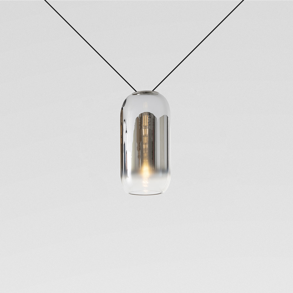 Artemide Gople Mini pendant lamp: cylindrical clear glass diffuser with silver inner shade, suspended on black cable