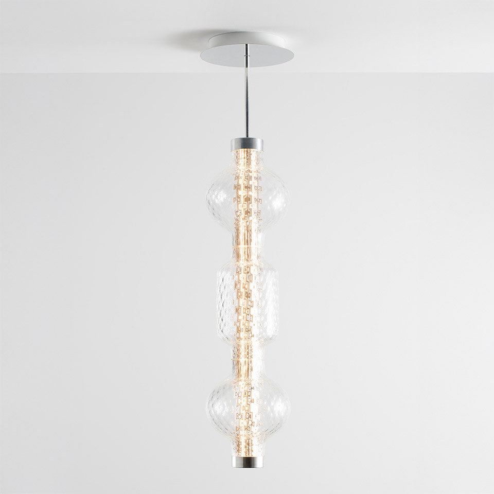 Artemide Alambicco pendant lamp: three clear glass spheres aligned vertically on a chrome central stem with warm LED light