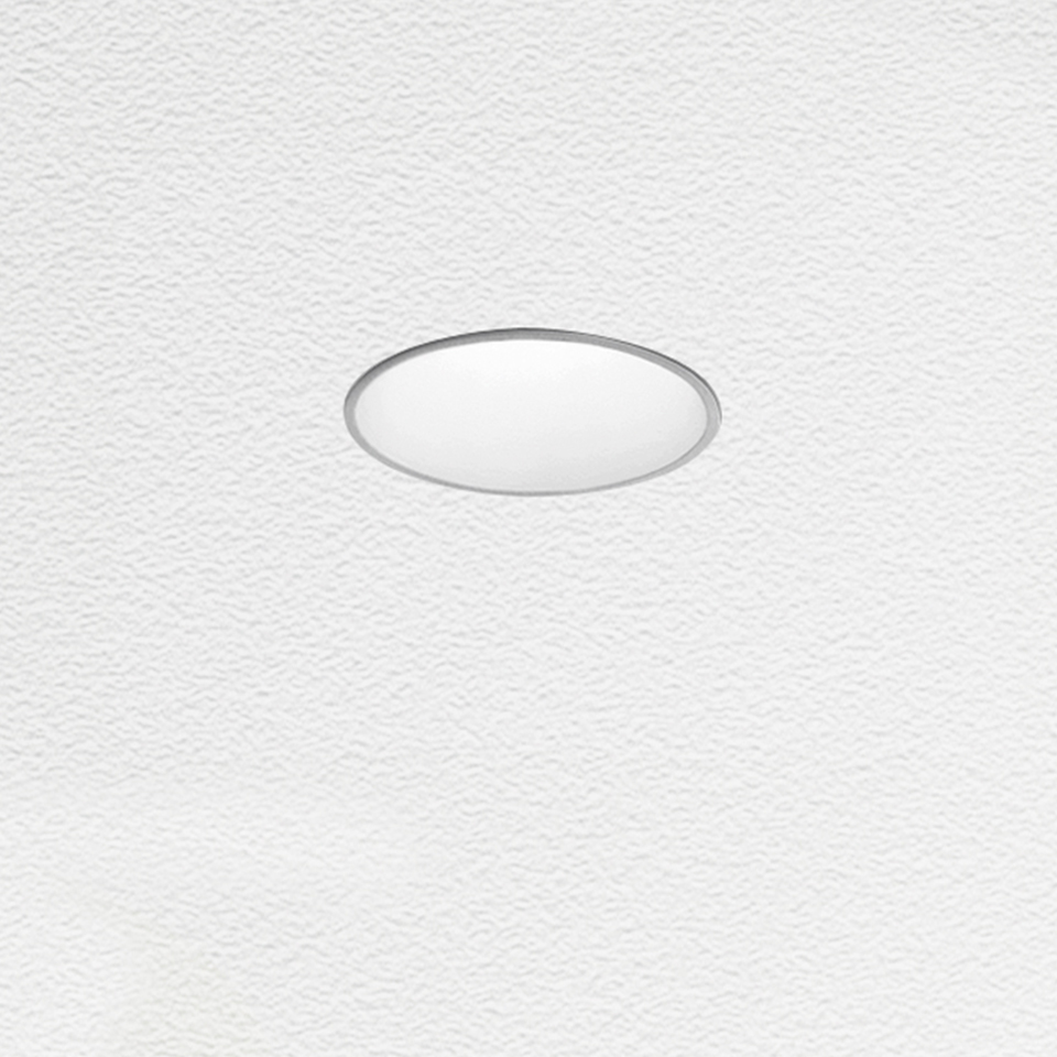 Tagora Incasso 80 di Artemide: faretto rotondo da incasso a soffitto con diffusore bianco e sottile anello di finitura cromato