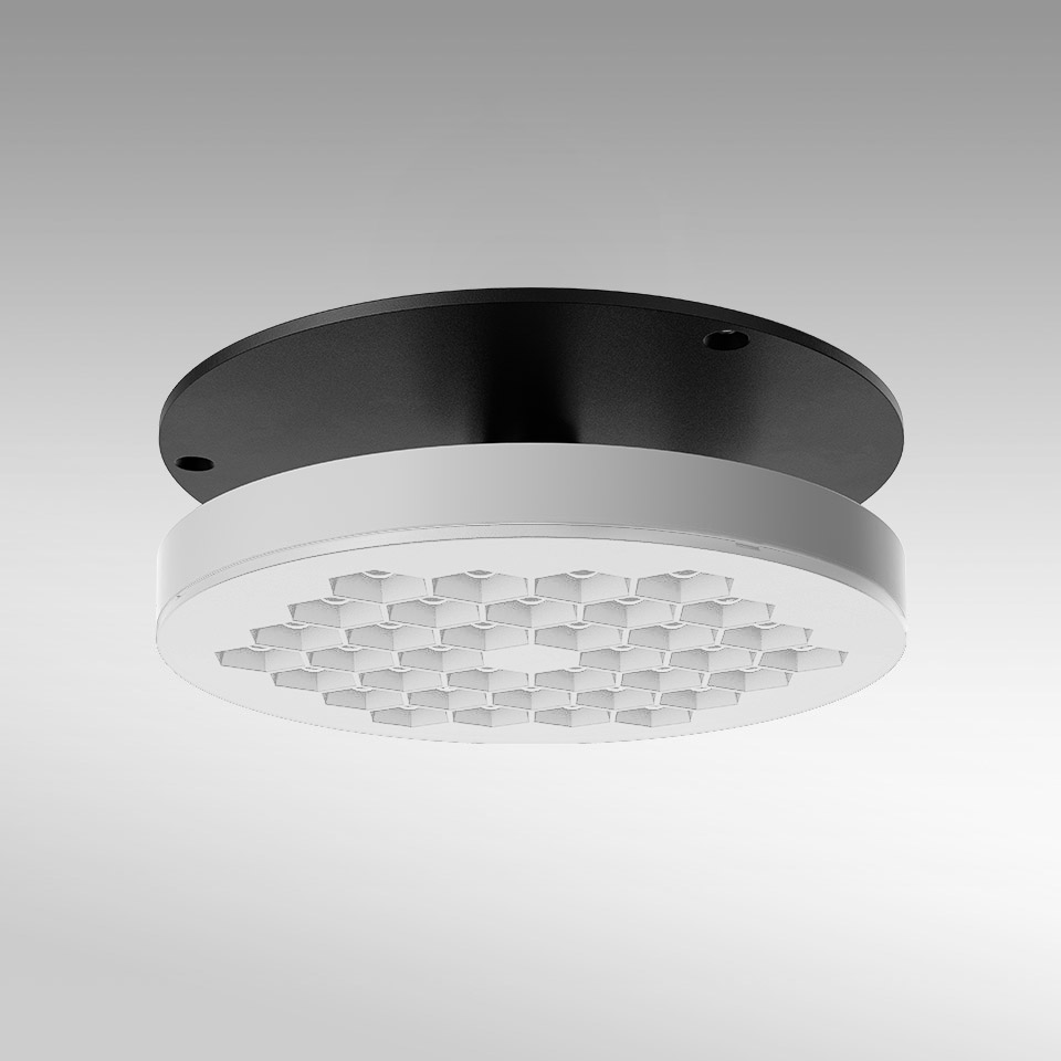 Lampada da soffitto Artemide Helgoland: corpo rotondo bianco con griglia LED a nido d'ape, montata su base circolare nera