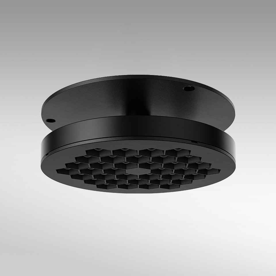 Plafoniera Artemide Helgoland Adjustable, corpo rotondo nero opaco con griglia diffusore a nido d'ape anti-abbagliamento, design a incasso