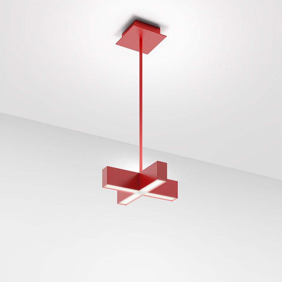Artemide Tetras pendant lamp in red, cross-shaped LED diffuser suspended by a slim red rod from a square ceiling canopy