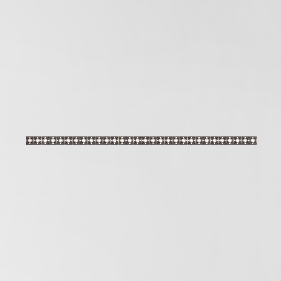 Artemide Somnĭum System: slim horizontal linear fixture with multiple recessed LED spotlights in a dark metal frame