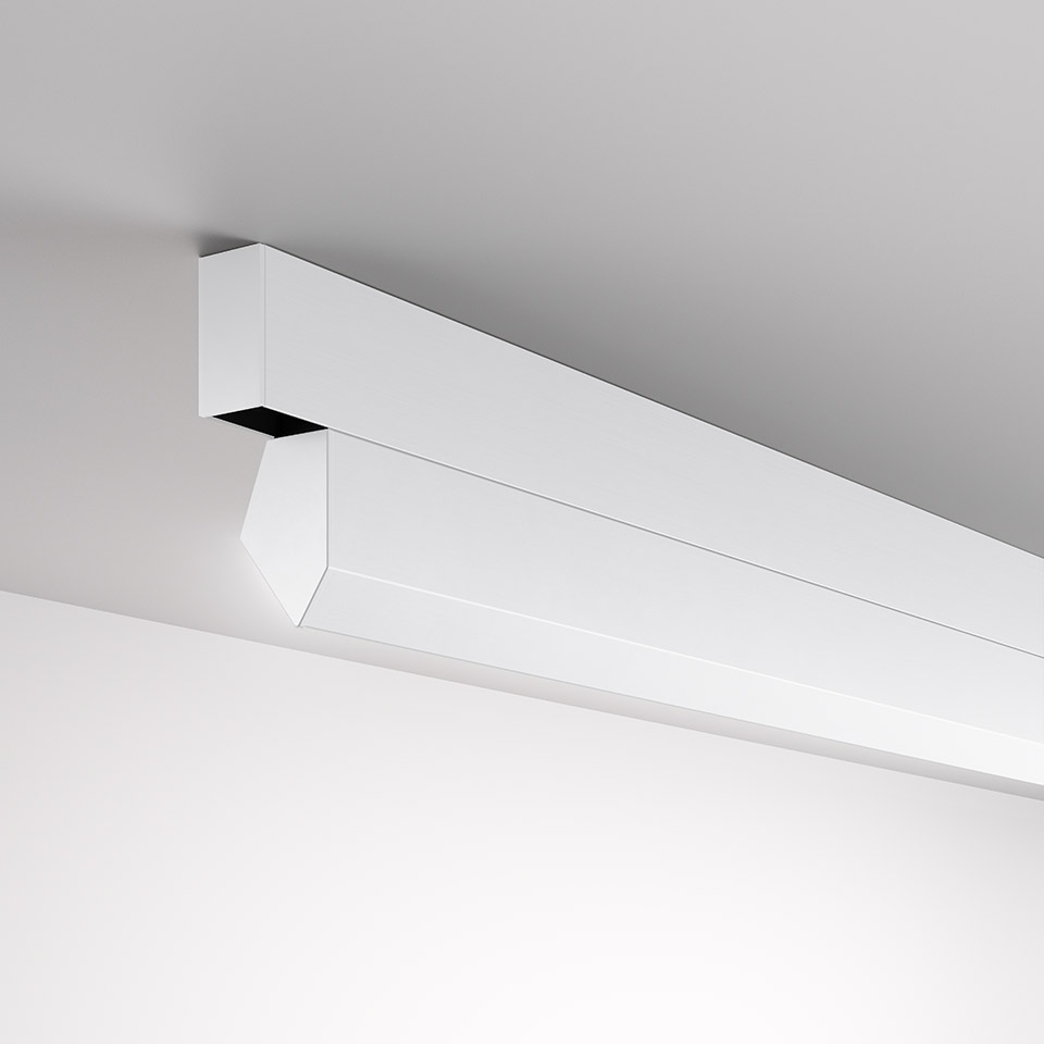 Artemide A.24 Wall Washer: sleek white linear ceiling-mounted fixture with angled head for directional wall grazing light