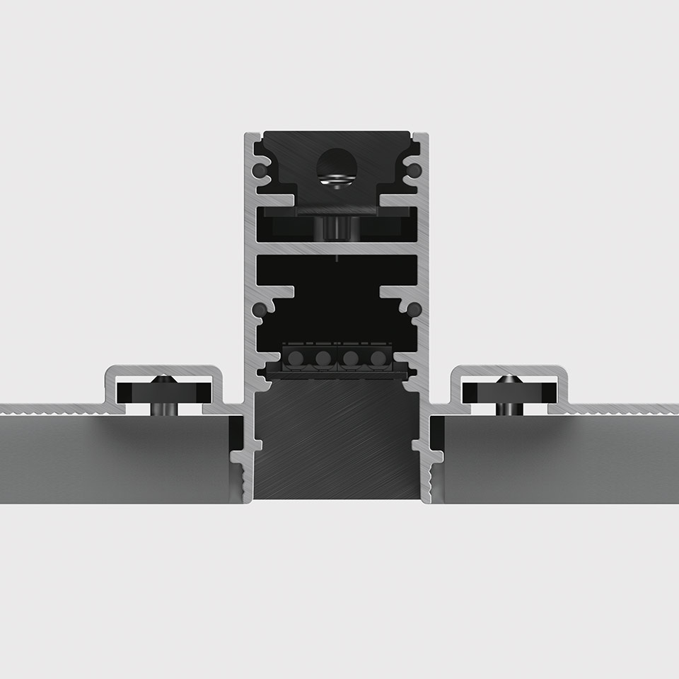 Dettaglio in sezione del sistema a binario magnetico Artemide A.24 con profilo in alluminio da incasso, rotaia magnetica e accessori di montaggio