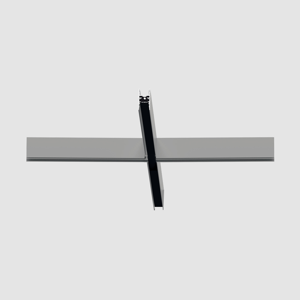 Artemide A.24 Emissione Diffusa: sistema a binario da incasso con modulo lineare nero diagonale che interseca un binario orizzontale in alluminio
