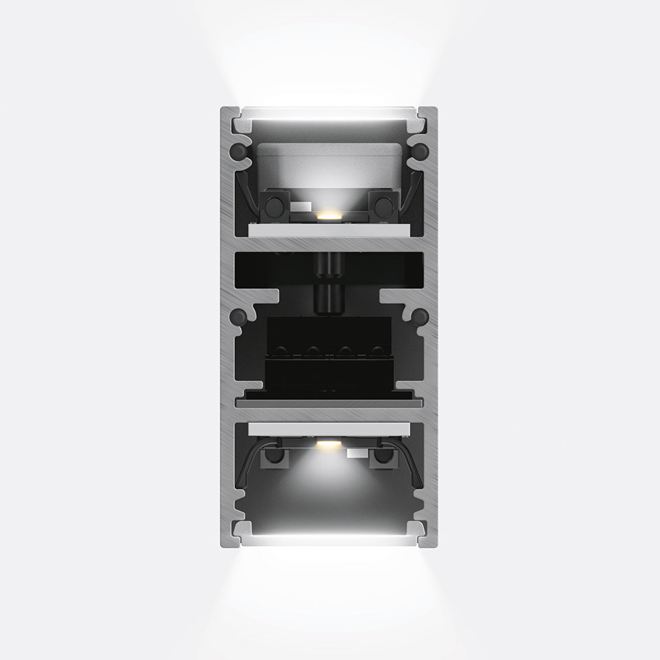 Applique Artemide A.24 Emissione Diffusa: profilo rettangolare in alluminio con doppio modulo LED che emette luce diffusa verso l'alto e il basso