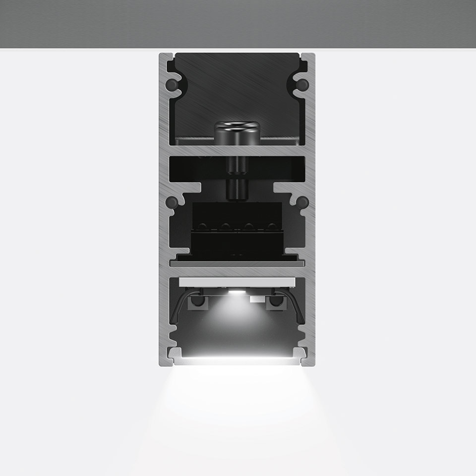 Sezione del modulo LED da incasso Artemide A.24 Emissione Diffusa, profilo in alluminio con fascio di luce bianca verso il basso
