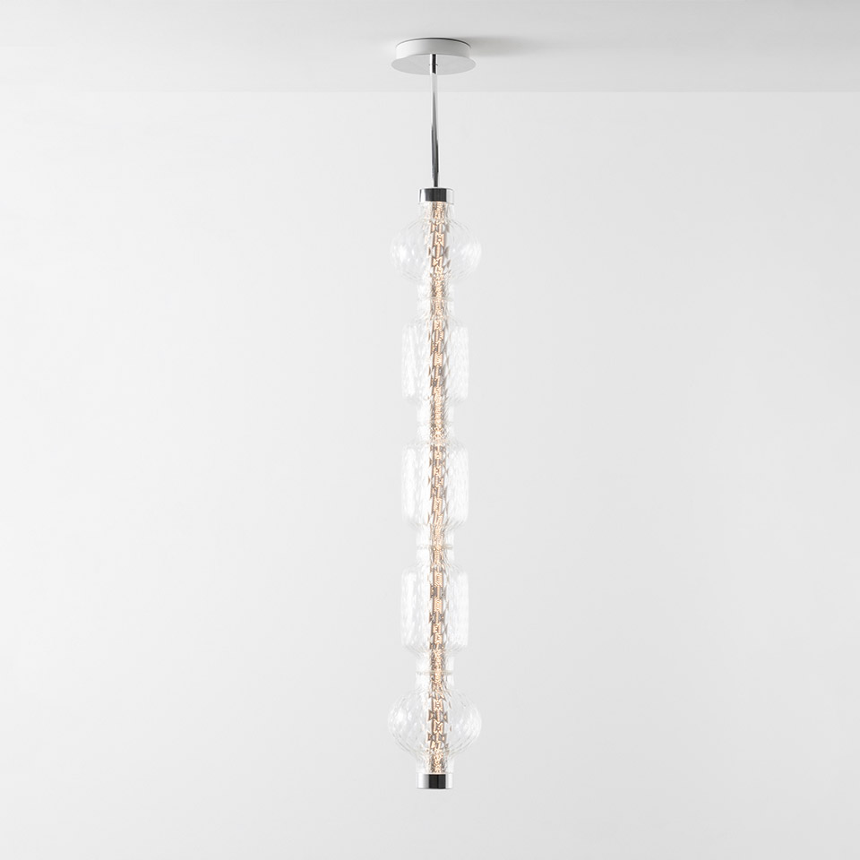 Artemide Alambicco pendant lamp: vertical column of clear glass globes on a chrome stem, suspended from a white ceiling canopy