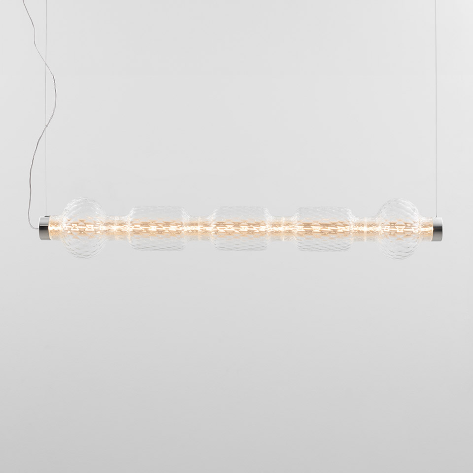 Artemide Alambicco horizontal pendant lamp: elongated glass tube with warm LED light and three spherical glass diffusers on chrome ends