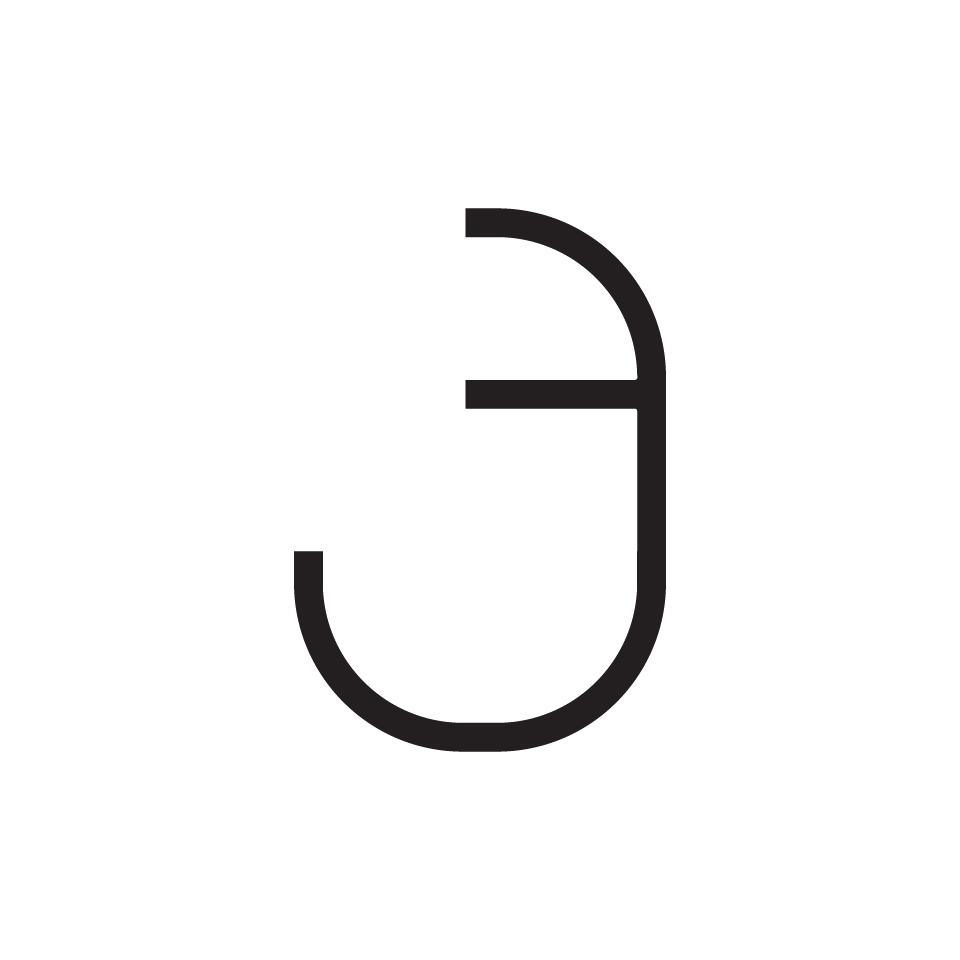 Artemide Alphabet of Light: lettera minuscola 'j' formata da una linea nera minimalista su sfondo bianco