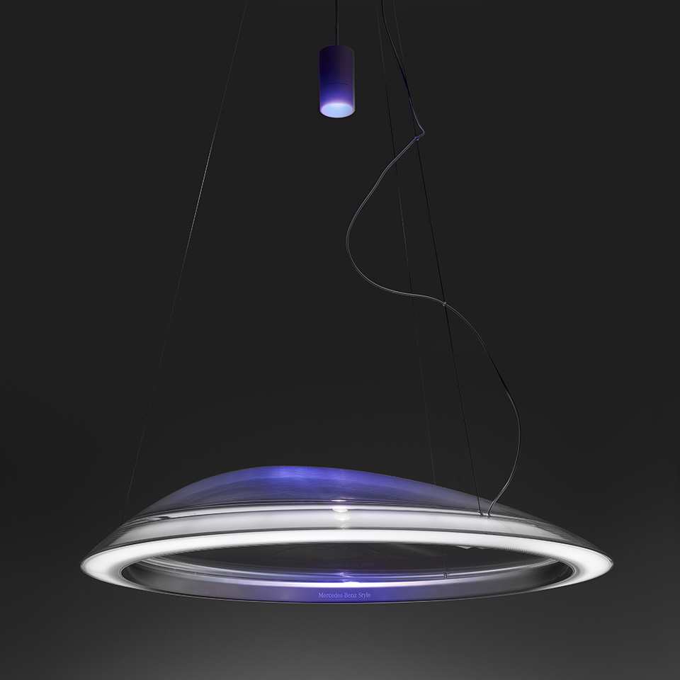 Artemide Ameluna pendant lamp: large circular disc-shaped diffuser in transparent glass with white and blue LED ring, suspended by thin cables
