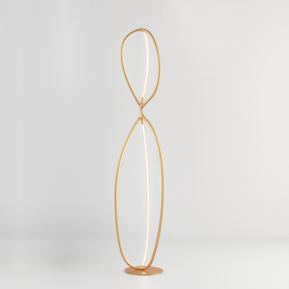 Lampada da terra Artemide Arrival: tubo LED dorato a forma di otto con due ovali allungati su base rotonda