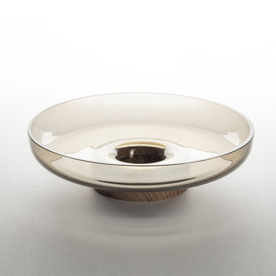Artemide Bontà table lamp: wide shallow smoked glass bowl diffuser with warm wood base, elegant minimalist design
