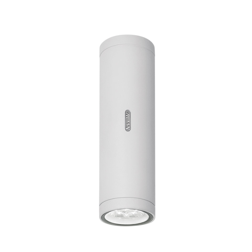 Artemide Calumet ceiling light: white cylindrical surface-mounted fixture with LED downlight at base