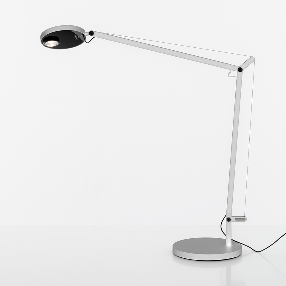 Artemide Demetra Professional desk lamp: articulated silver arm with circular black LED head on round base