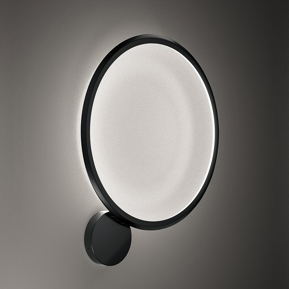 Artemide Discovery Parete wall lamp: large circular LED diffuser with white opal glass, black metal frame, mounted via small round bracket