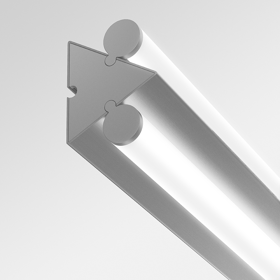 Close-up of Artemide Dreispitz linear LED fixture end cap, showing triangular aluminum profile with interlocking connector detail