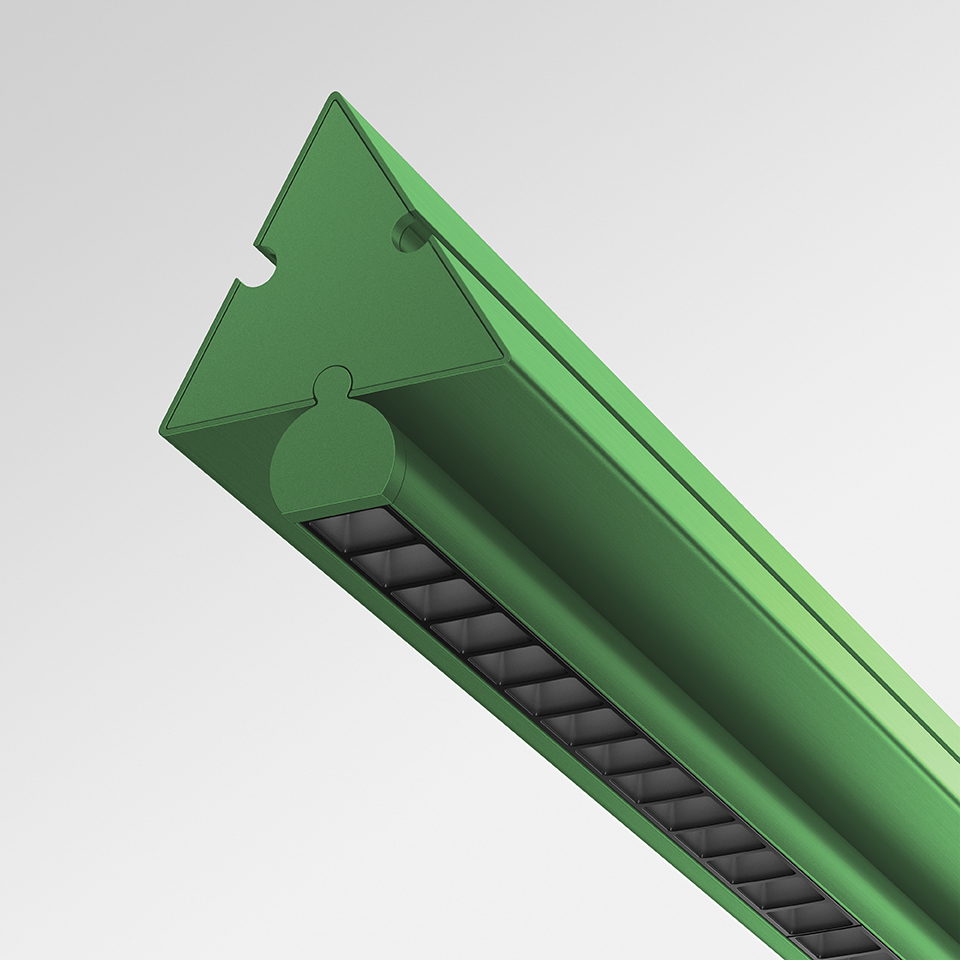 Dreispitz linear LED fixture in green, triangular aluminum profile with louvered light diffuser, shown in close-up detail
