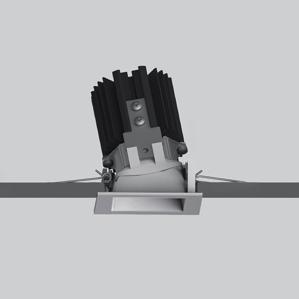 Faretto da incasso Artemide Everything 55 con modulo LED orientabile, cornice quadrata, alette di raffreddamento e molle per installazione a soffitto