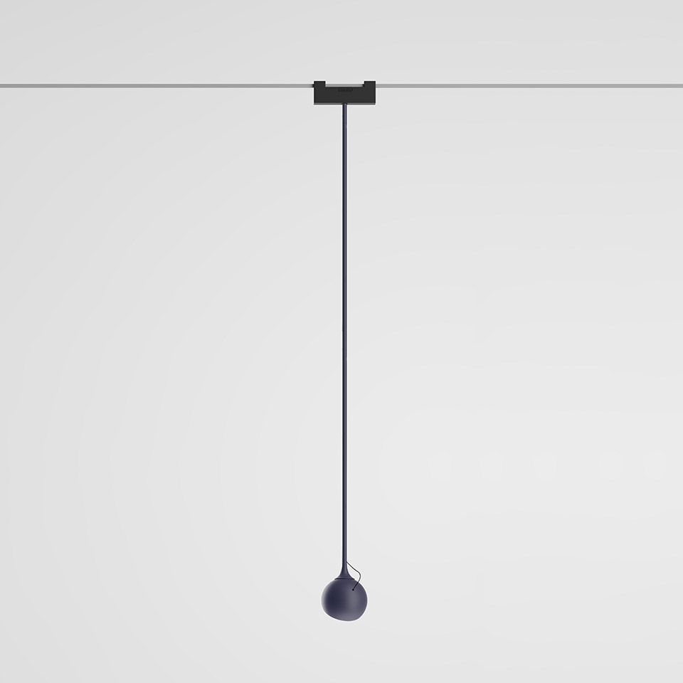 Artemide Funivia pendant lamp: dark blue spherical head on a long slim cord suspended from a ceiling cable track system