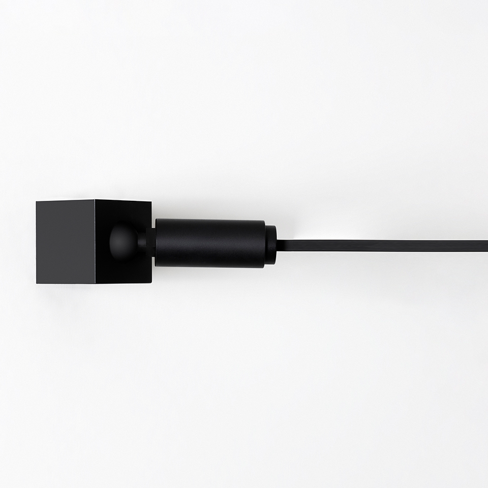 Funivia wall lamp by Artemide: matte black square wall bracket with cylindrical joint and slim horizontal rod extending outward