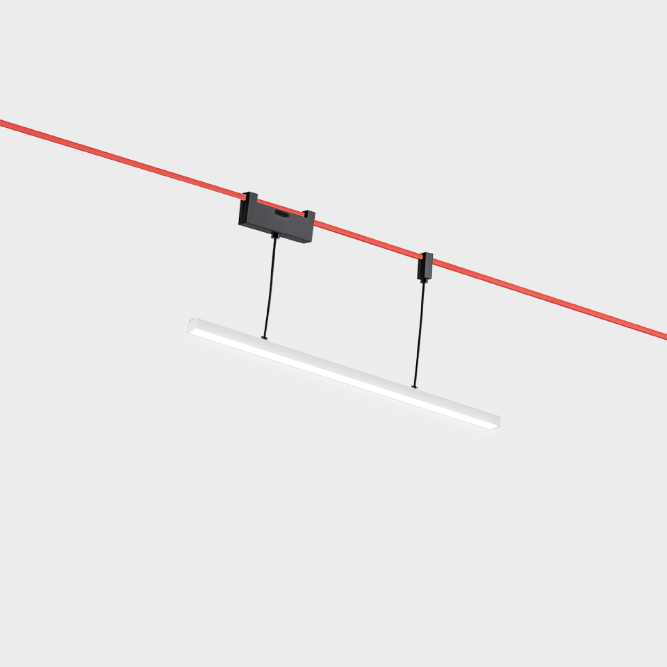 Artemide Funivia pendant lamp: slim white LED bar suspended by black cables from a red cable-car track system with black connector