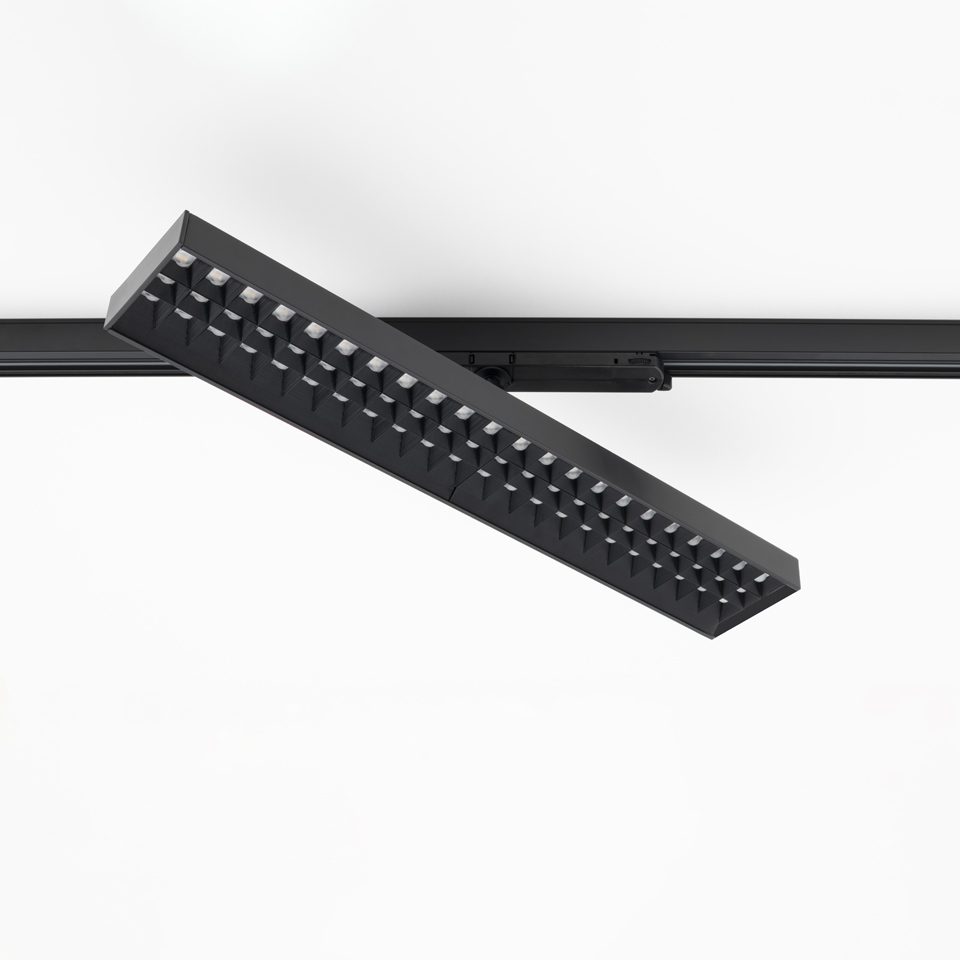 Artemide Hoy Refractive 3-Phase Track light in black, angled linear LED fixture with refractive grid cells mounted on ceiling track
