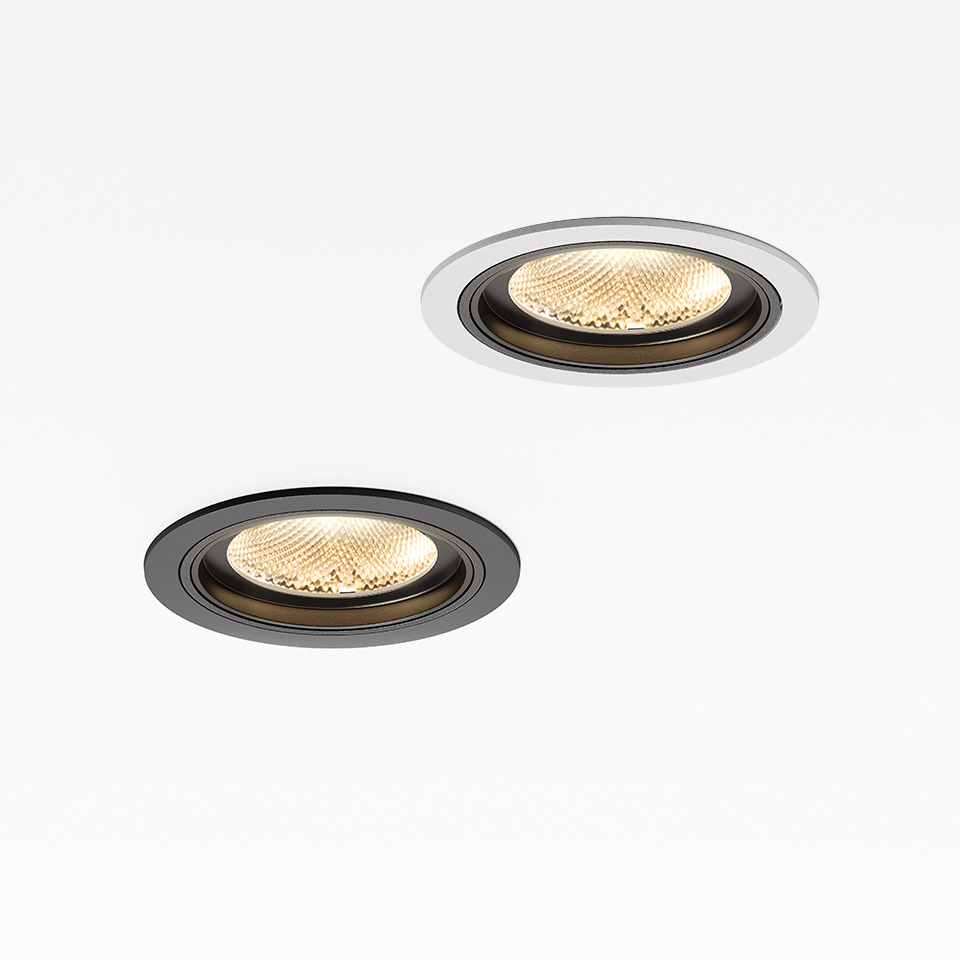 Due faretti da incasso LED Artemide Hoy Spot: uno con bordo nero e uno bianco, entrambi con lente a nido d'ape in tono caldo. - 2