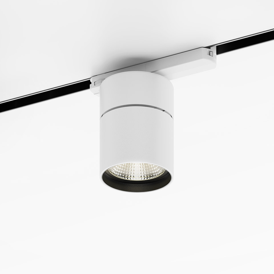 Artemide Hoy Spot 3-Phase Track: faretto LED cilindrico bianco montato su binario nero, con riflettore interno scuro - 2