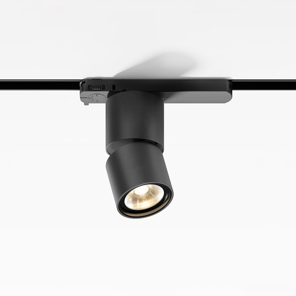 Artemide Hoy Spot 3 fasi: faretto LED cilindrico nero orientabile montato su binario trifase nero