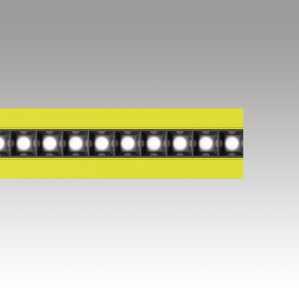 Dettaglio striscia LED Katà Métron: fila di LED SMD bianco brillante su PCB nero con substrato flessibile giallo