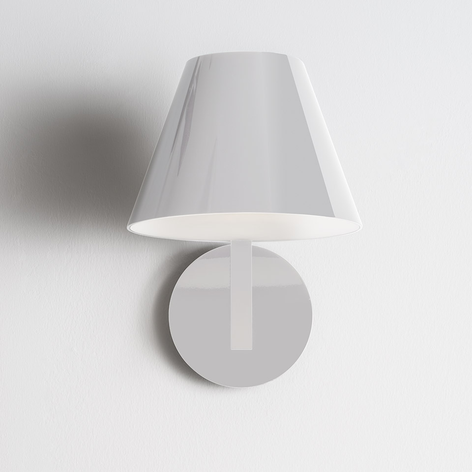 Artemide La Petite Wall lamp: glossy white conical shade mounted on a circular wall bracket, minimalist design