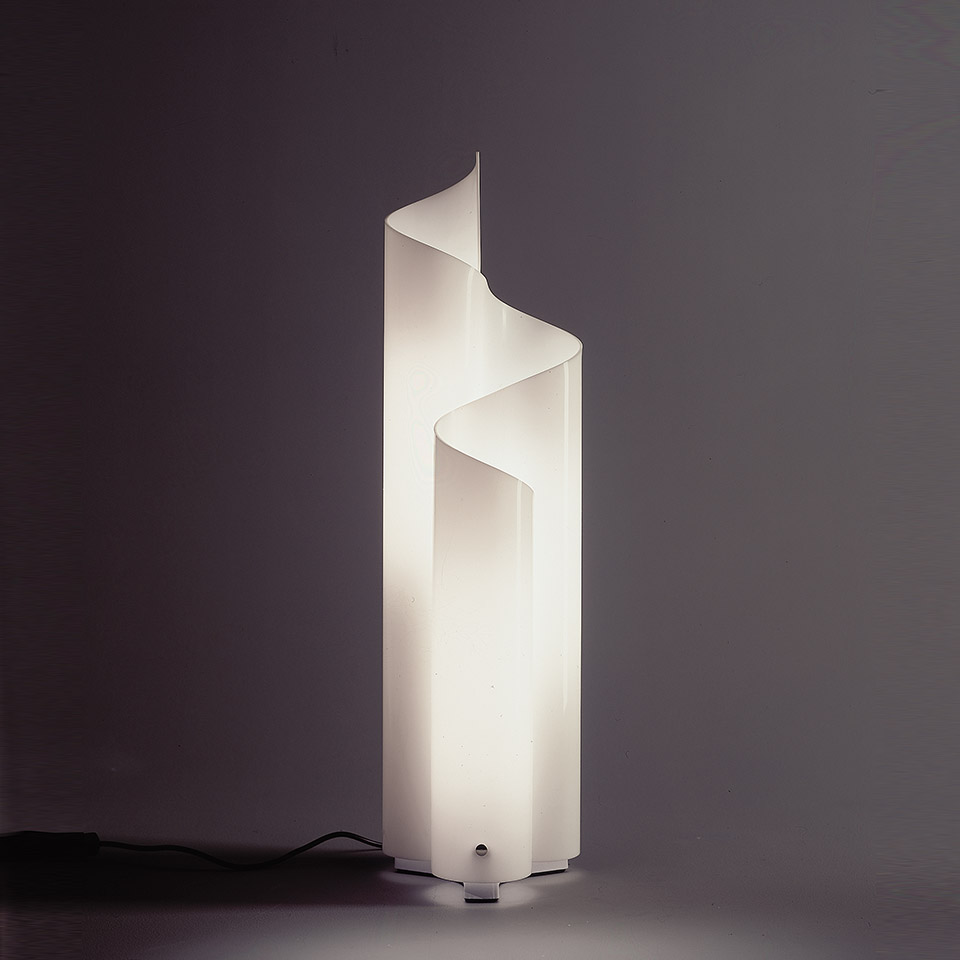 Artemide Mezzachimera floor lamp: sculptural white opal diffuser with spiral ribbon shape, emitting soft diffused light