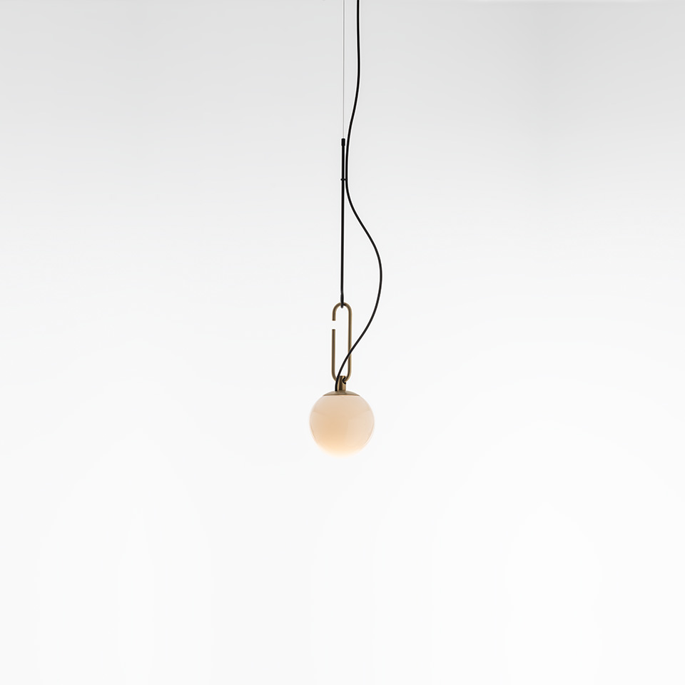 Artemide NH pendant lamp: opal white glass sphere suspended from a brass oval loop fitting on a black cord