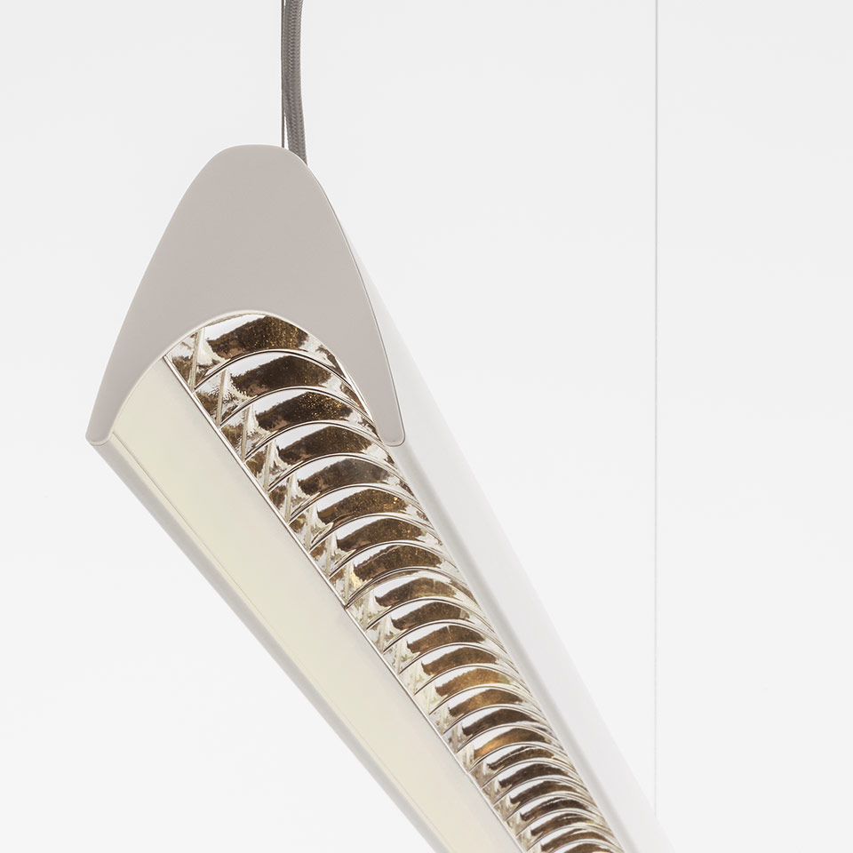 Artemide Series Y pendant lamp, white tapered body with internal gold ribbed reflector, suspended by a cable