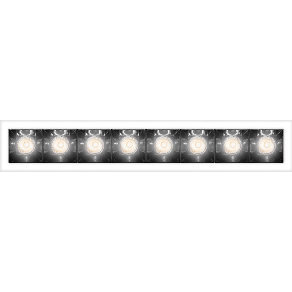Artemide Sharp Refractive Emission: apparecchio lineare da incasso con 8 faretti LED in cornice bianca, con fasci luminosi concentrati