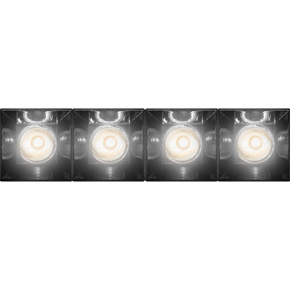 Four Artemide Sharp recessed spotlights in a row, each with a bright LED source inside a dark square housing