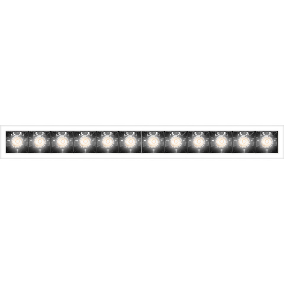 Apparecchio lineare Artemide Sharp Refractive Emission con multipli faretti LED a incasso in cornice rettangolare bianca