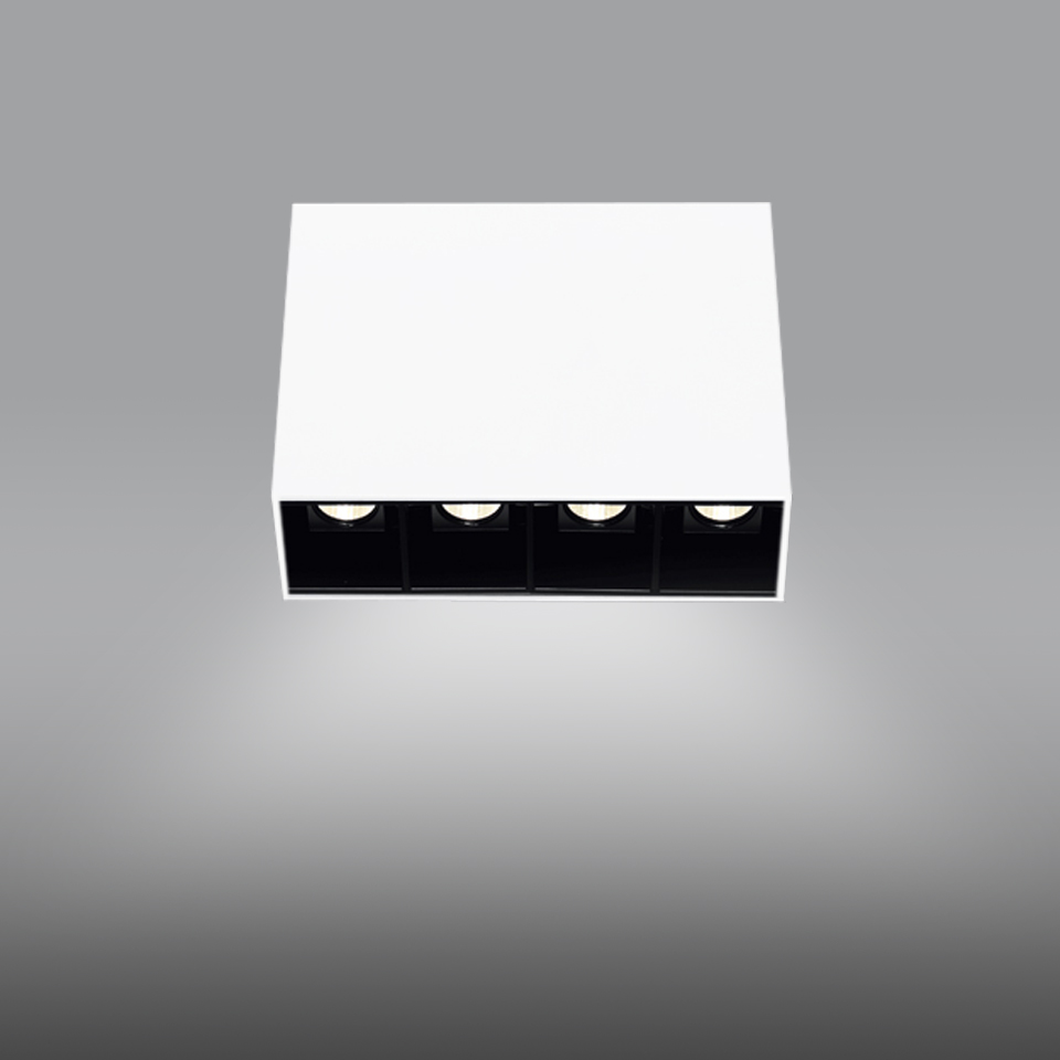 Artemide Sharp SMD ceiling light: white rectangular body with four recessed LED spots in a black inner housing