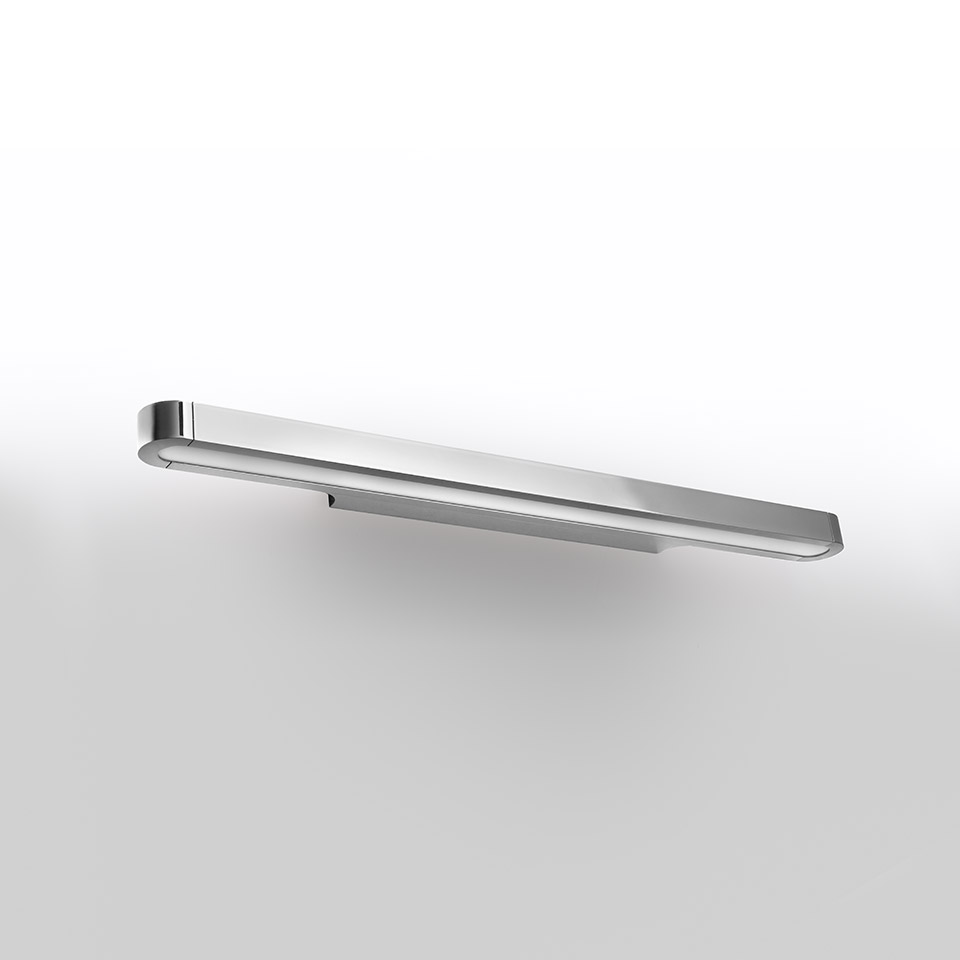 Artemide Talo wall lamp: sleek horizontal LED bar in polished chrome finish, mounted on wall, emitting diffused light downward
