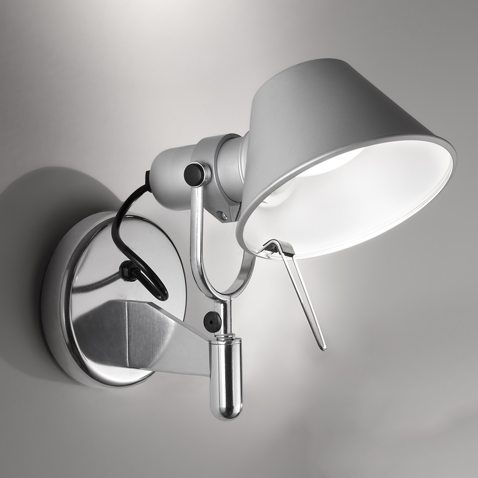 Artemide Tolomeo Parete wall lamp in aluminium with adjustable arm, pivoting shade, and counterweight, mounted on circular wall bracket