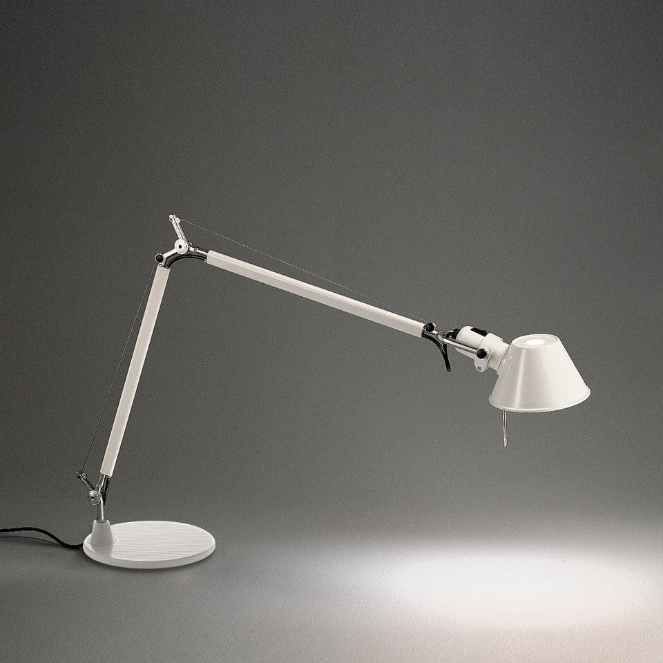 Artemide Tolomeo Tavolo desk lamp in white, featuring adjustable articulated arm with tension cable and conical shade on round base