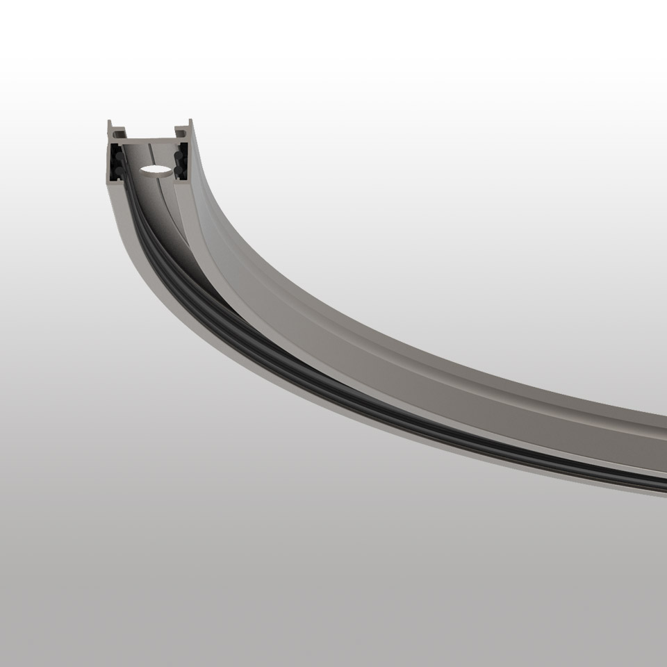 Artemide Turn Around System: sezione curva del binario in alluminio grigio, progettata per installazioni luminose modulari flessibili