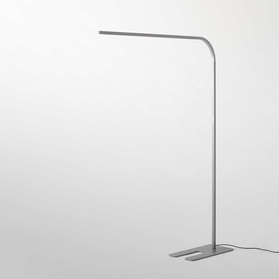 Artemide Turn Around Floor lamp: slim silver aluminum stem with curved top, horizontal LED bar, and flat rectangular base